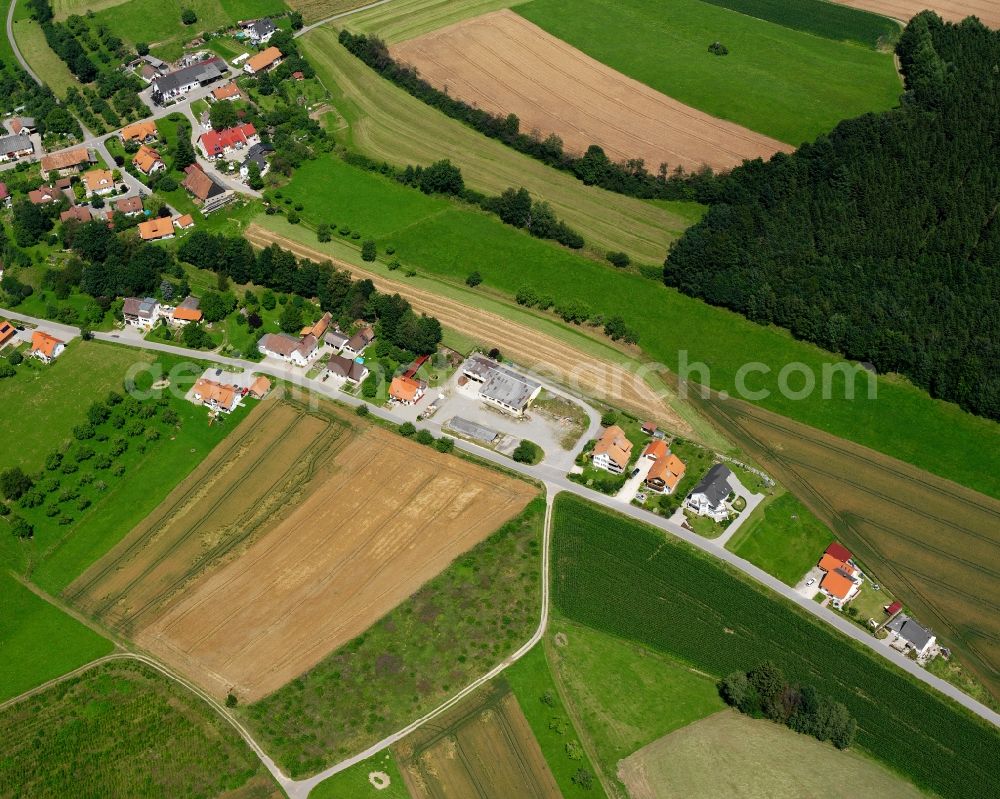 Aerial photograph Spöck - Agricultural land and field boundaries surround the settlement area of the village in Spöck in the state Baden-Wuerttemberg, Germany