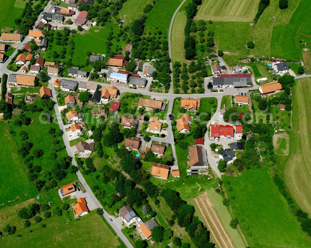 Spöck from above - Agricultural land and field boundaries surround the settlement area of the village in Spöck in the state Baden-Wuerttemberg, Germany