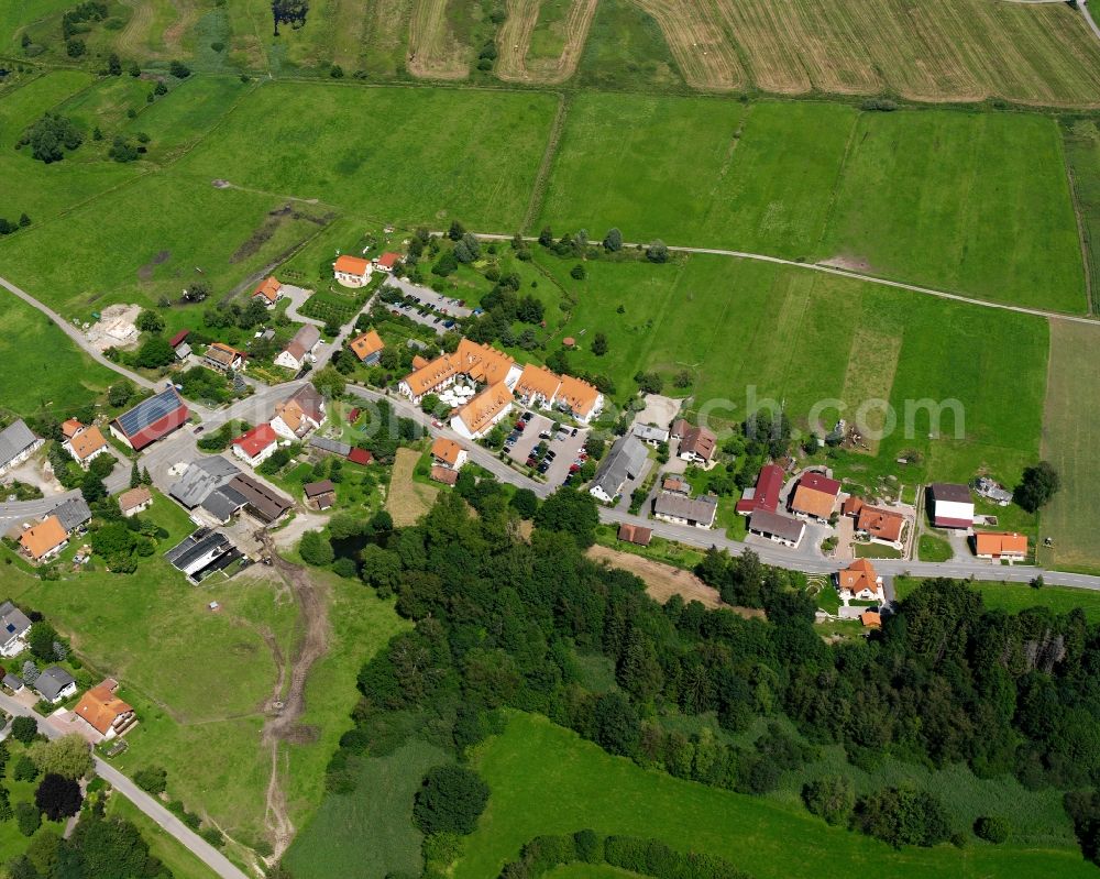 Aerial photograph Spöck - Agricultural land and field boundaries surround the settlement area of the village in Spöck in the state Baden-Wuerttemberg, Germany