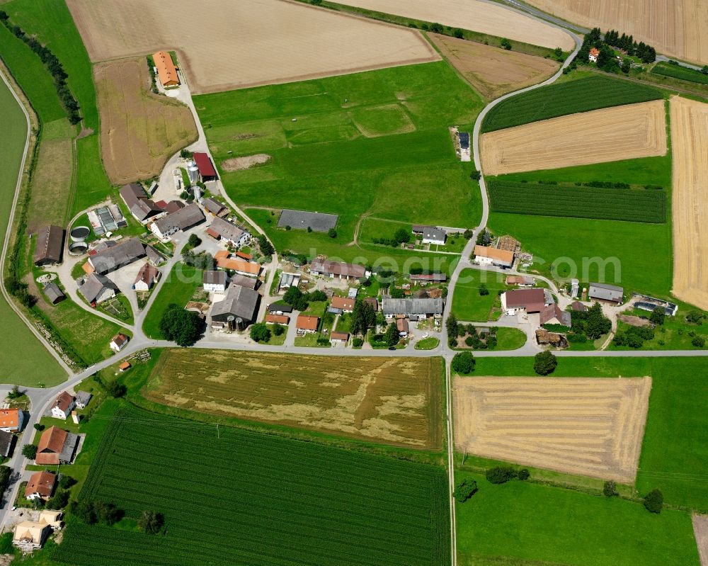 Spöck from above - Agricultural land and field boundaries surround the settlement area of the village in Spöck in the state Baden-Wuerttemberg, Germany