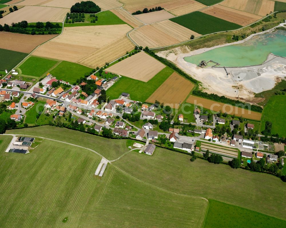 Aerial photograph Spöck - Agricultural land and field boundaries surround the settlement area of the village in Spöck in the state Baden-Wuerttemberg, Germany