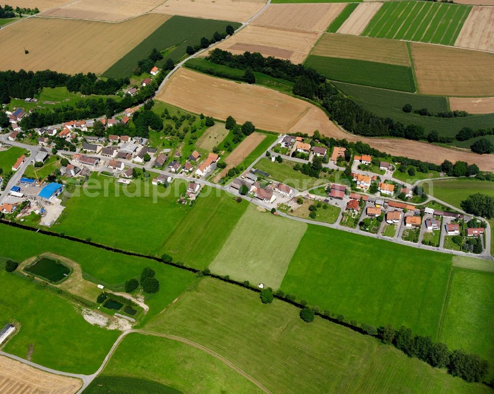 Spöck from above - Agricultural land and field boundaries surround the settlement area of the village in Spöck in the state Baden-Wuerttemberg, Germany