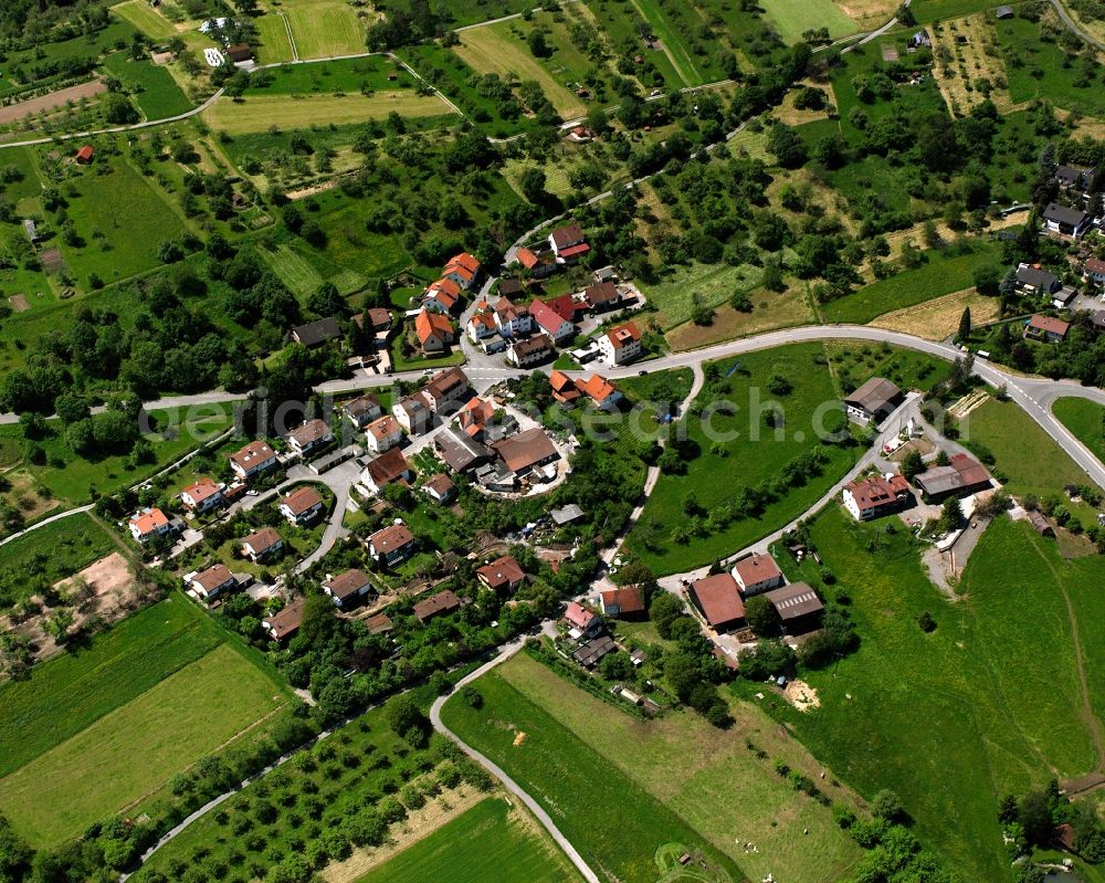 Spechtshof from above - Agricultural land and field boundaries surround the settlement area of the village in Spechtshof in the state Baden-Wuerttemberg, Germany