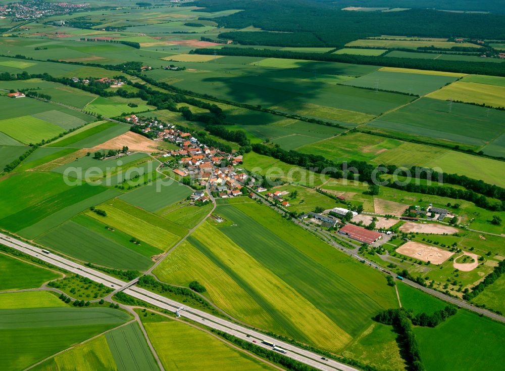 Standenbühl from above - Agricultural land and field boundaries surround the settlement area of the village in Standenbühl in the state Rhineland-Palatinate, Germany