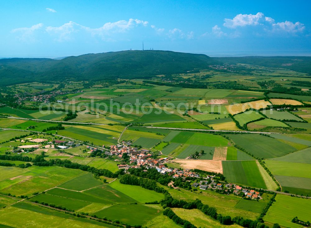 Aerial photograph Standenbühl - Agricultural land and field boundaries surround the settlement area of the village in Standenbühl in the state Rhineland-Palatinate, Germany