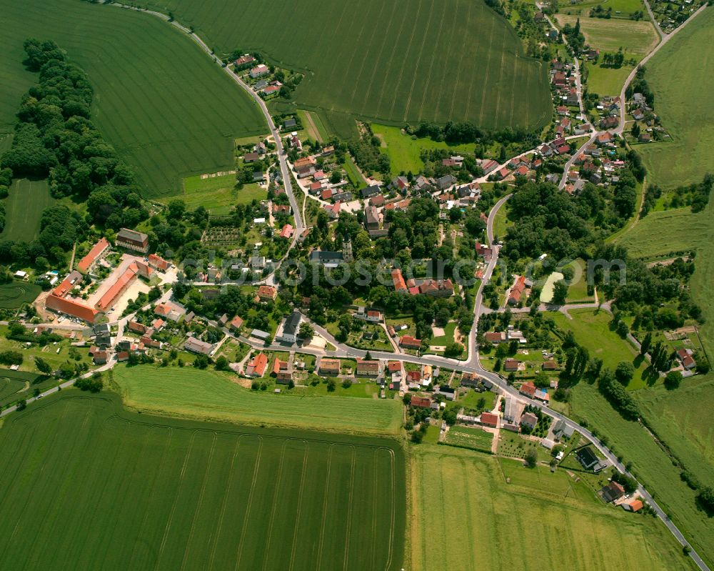 Aerial image Staucha - Agricultural land and field boundaries surround the settlement area of the village in Staucha in the state Saxony, Germany