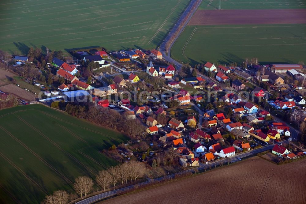 Aerial photograph Stedten - Agricultural land and field boundaries surround the settlement area of the village in Stedten in the state Thuringia, Germany