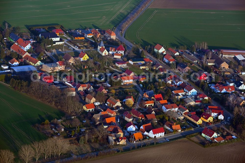 Stedten from above - Agricultural land and field boundaries surround the settlement area of the village in Stedten in the state Thuringia, Germany