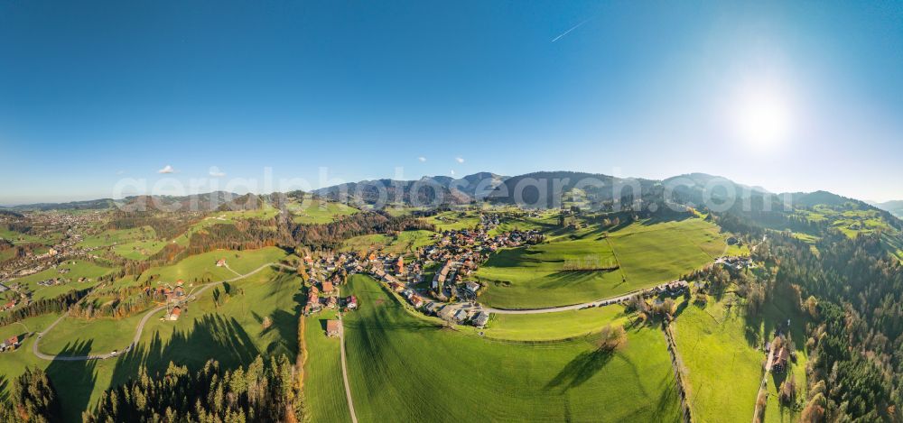 Steibis from the bird's eye view: Agricultural land and field boundaries surround the settlement area of the village in Steibis Allgaeu in the state Bavaria, Germany