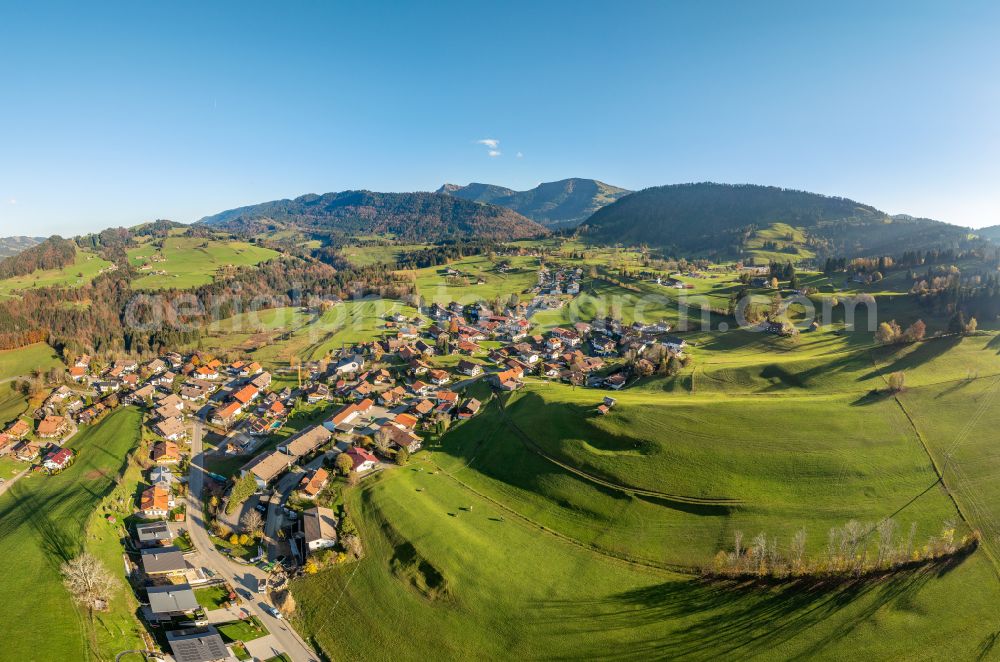 Aerial image Steibis - Agricultural land and field boundaries surround the settlement area of the village in Steibis Allgaeu in the state Bavaria, Germany