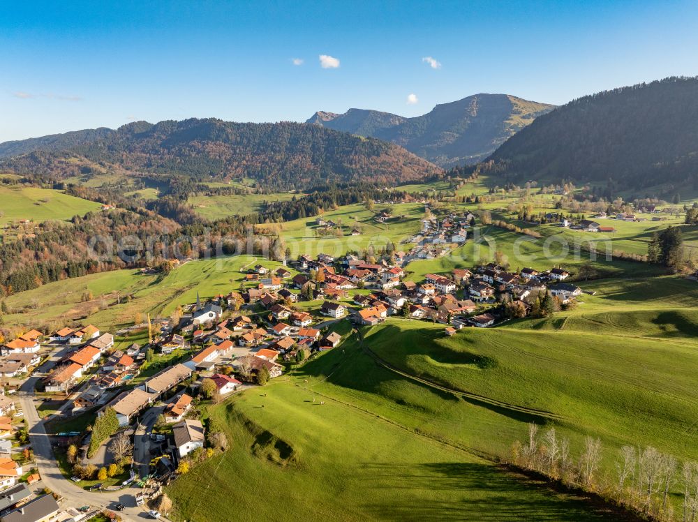 Aerial photograph Steibis - Agricultural land and field boundaries surround the settlement area of the village in Steibis Allgaeu in the state Bavaria, Germany