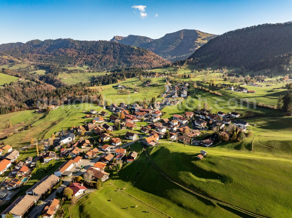 Aerial image Steibis - Agricultural land and field boundaries surround the settlement area of the village in Steibis Allgaeu in the state Bavaria, Germany