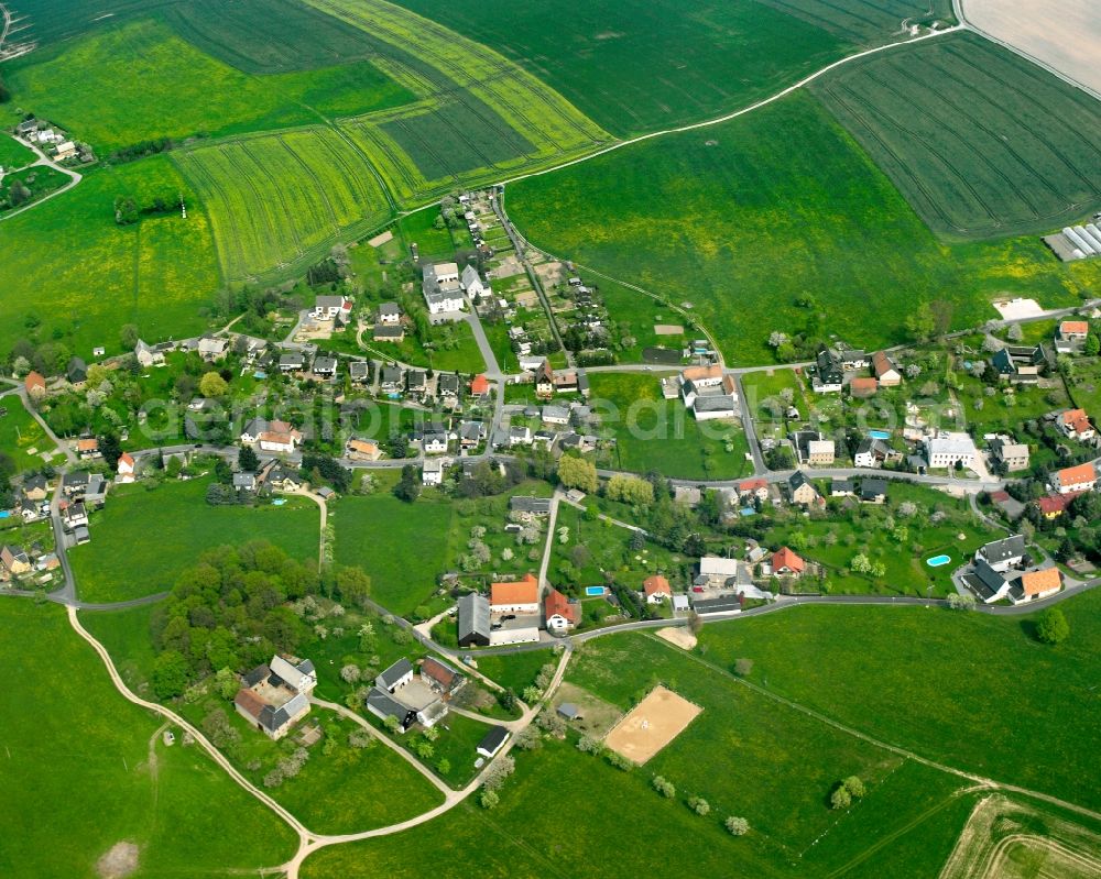 Stein from above - Agricultural land and field boundaries surround the settlement area of the village in Stein in the state Saxony, Germany