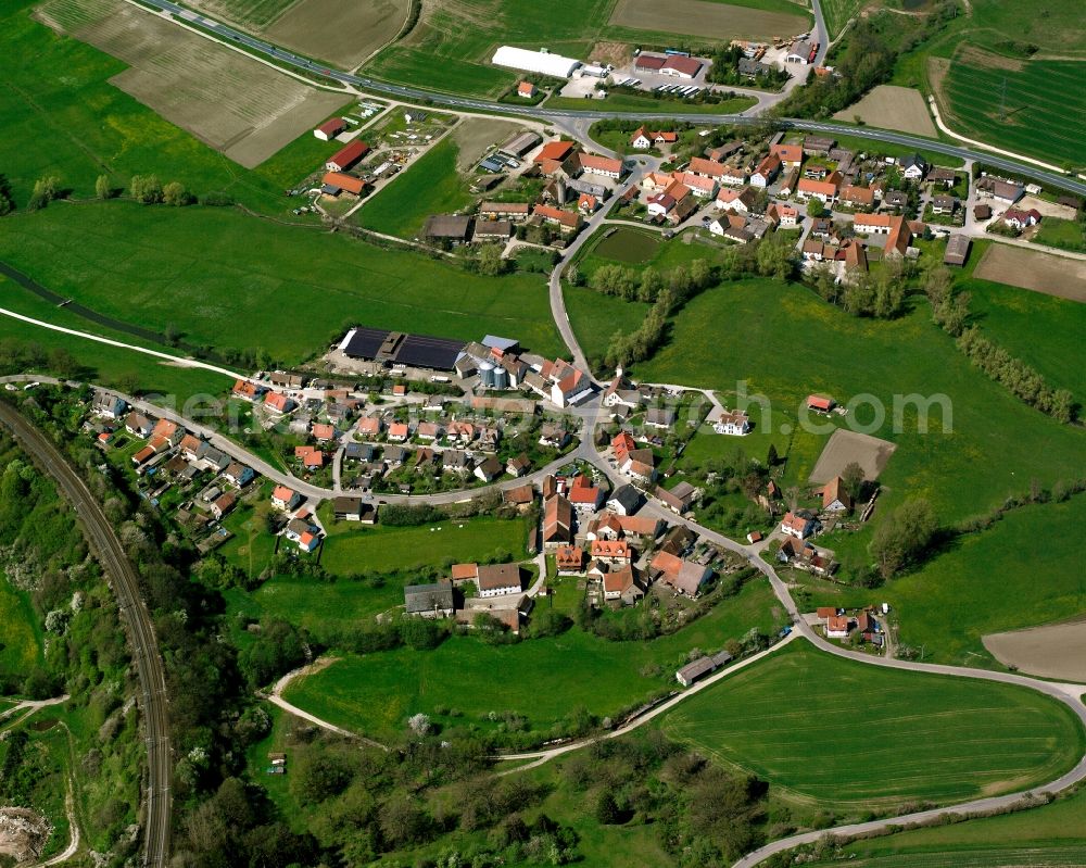 Aerial image Steinbach - Agricultural land and field boundaries surround the settlement area of the village in Steinbach in the state Bavaria, Germany