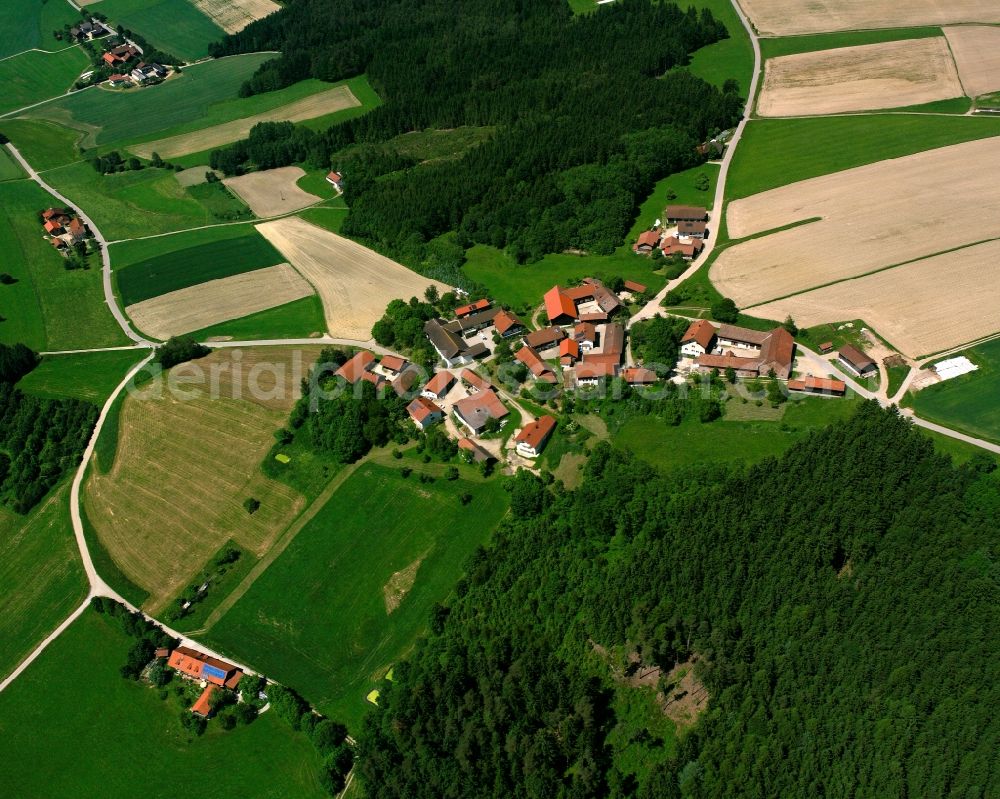 Aerial image Steinbach - Agricultural land and field boundaries surround the settlement area of the village in Steinbach in the state Bavaria, Germany