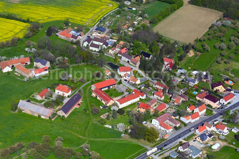 Aerial image Steindörfel - Agricultural land and field boundaries surround the settlement area of the village on B6 in Steindoerfel in the state Saxony, Germany