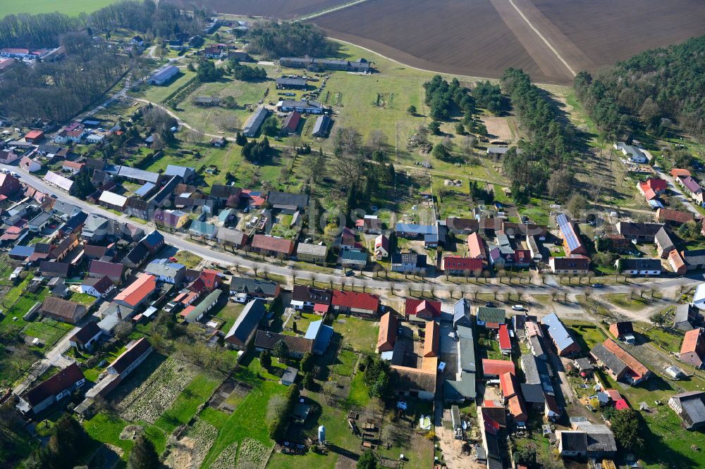 Aerial image Stepenitz - Agricultural land and field boundaries surround the settlement area of the village in Stepenitz in the state Brandenburg, Germany