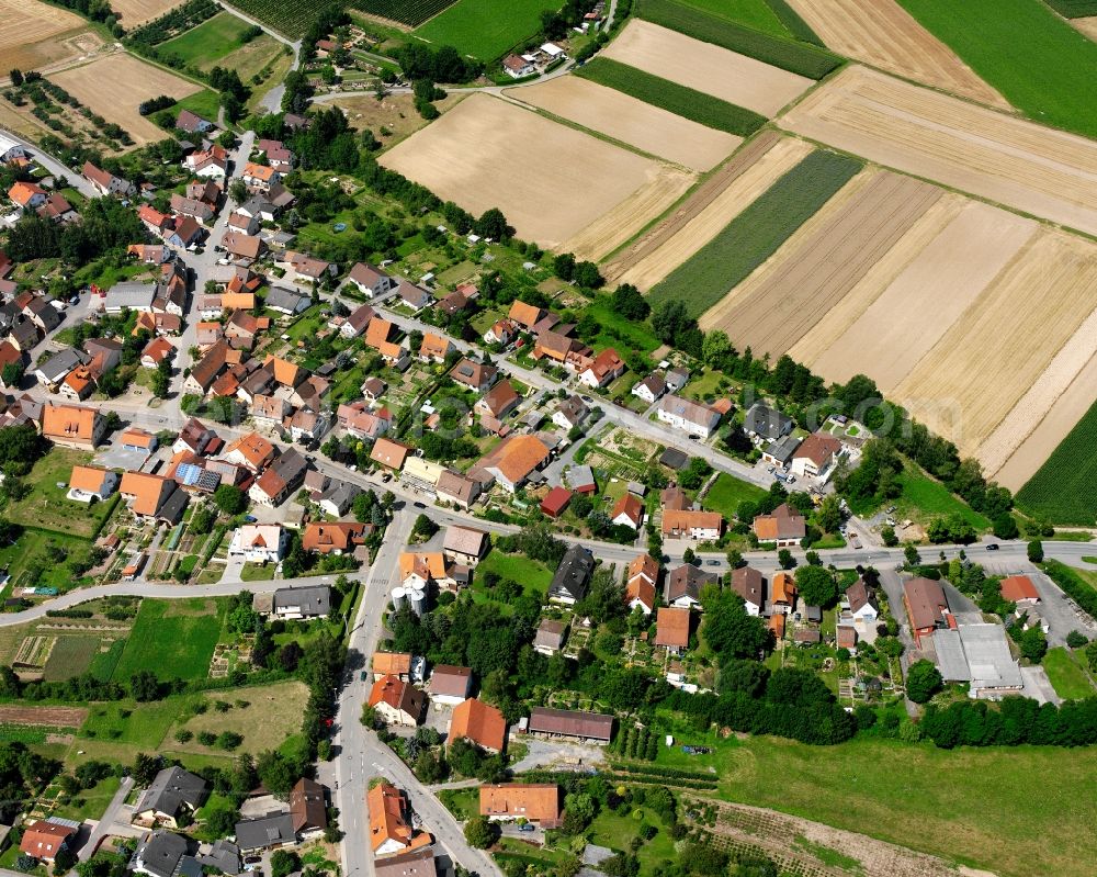 Stetten a.H. from above - Agricultural land and field boundaries surround the settlement area of the village in Stetten a.H. in the state Baden-Wuerttemberg, Germany