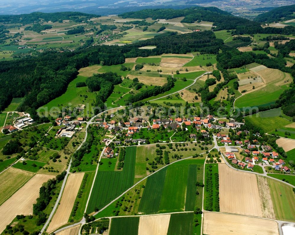 Stetten from above - Agricultural land and field boundaries surround the settlement area of the village in Stetten in the state Baden-Wuerttemberg, Germany