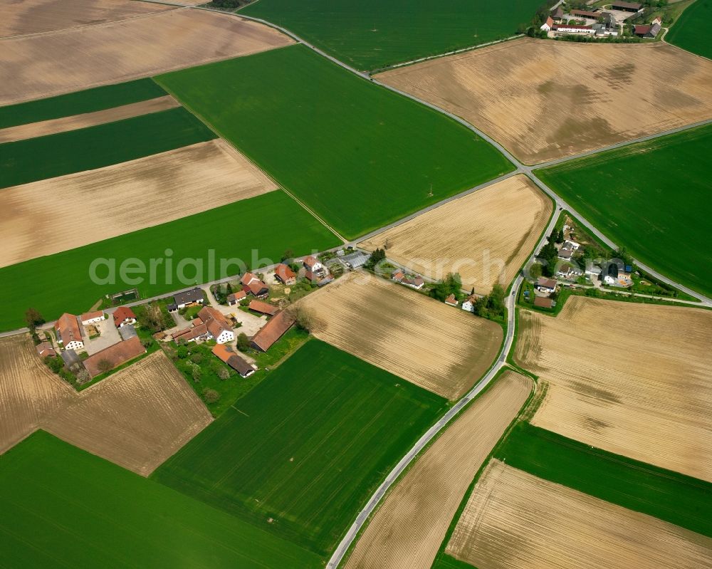 Stetten from above - Agricultural land and field boundaries surround the settlement area of the village in Stetten in the state Bavaria, Germany