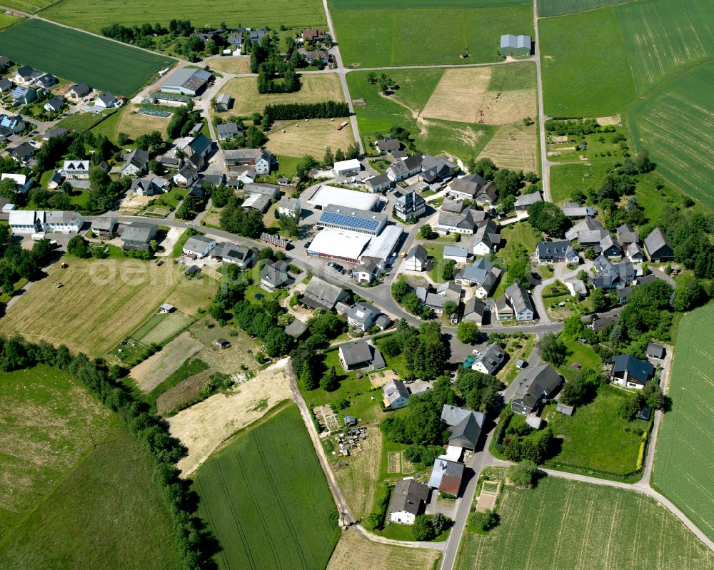 Aerial image St.Georgenhausen - Agricultural land and field boundaries surround the settlement area of the village in St.Georgenhausen in the state Rhineland-Palatinate, Germany