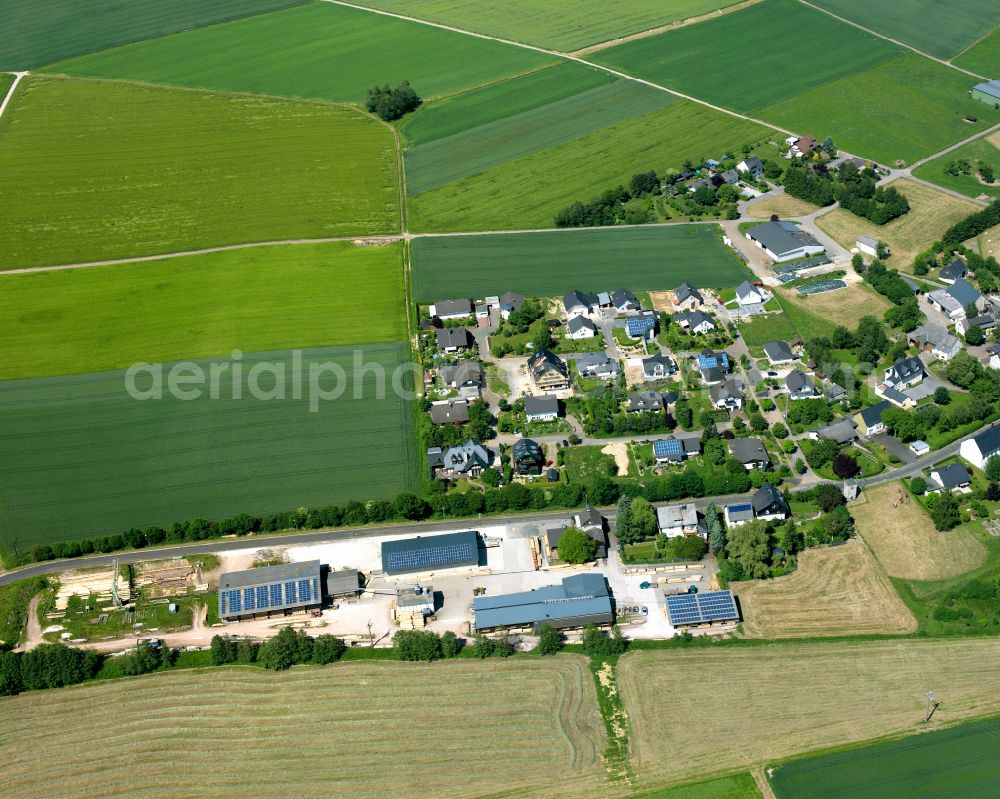 Aerial photograph St.Georgenhausen - Agricultural land and field boundaries surround the settlement area of the village in St.Georgenhausen in the state Rhineland-Palatinate, Germany