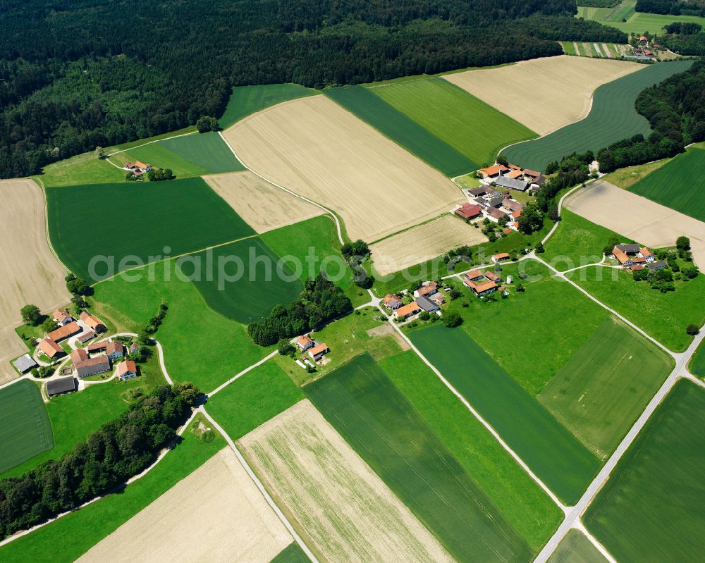 Aerial image Stockach - Agricultural land and field boundaries surround the settlement area of the village in Stockach in the state Bavaria, Germany