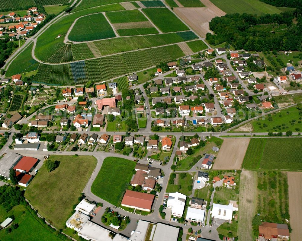 Stockheim from the bird's eye view: Agricultural land and field boundaries surround the settlement area of the village in Stockheim in the state Baden-Wuerttemberg, Germany