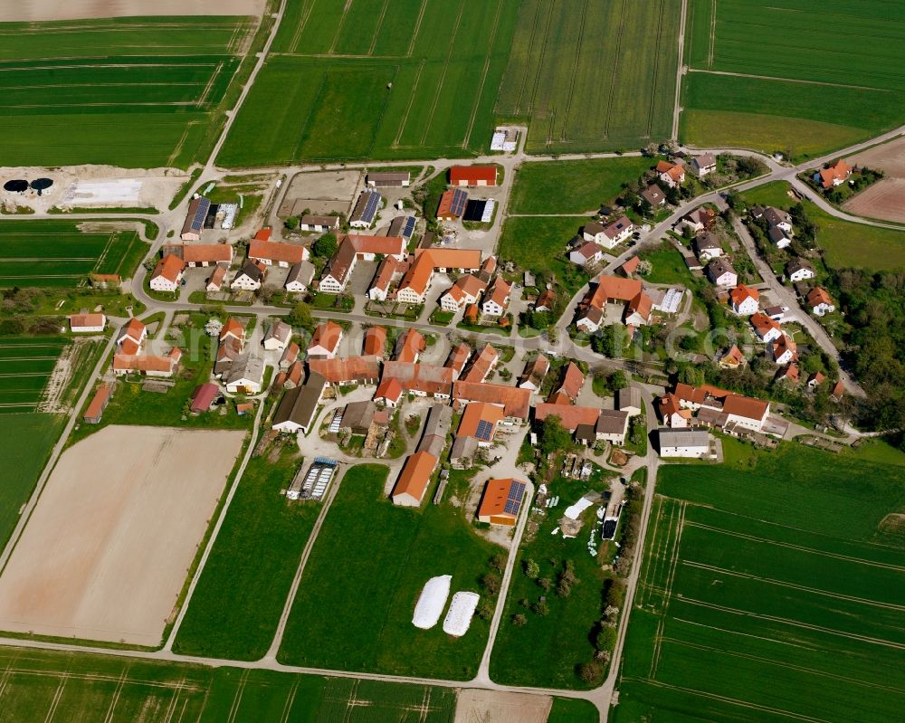 Aerial image Strüth - Agricultural land and field boundaries surround the settlement area of the village in Strüth in the state Bavaria, Germany