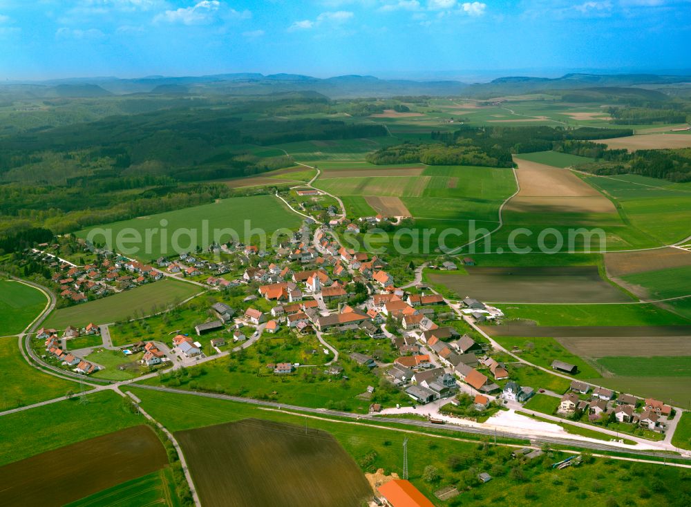 Stubersheim from above - Agricultural land and field boundaries surround the settlement area of the village in Stubersheim in the state Baden-Wuerttemberg, Germany