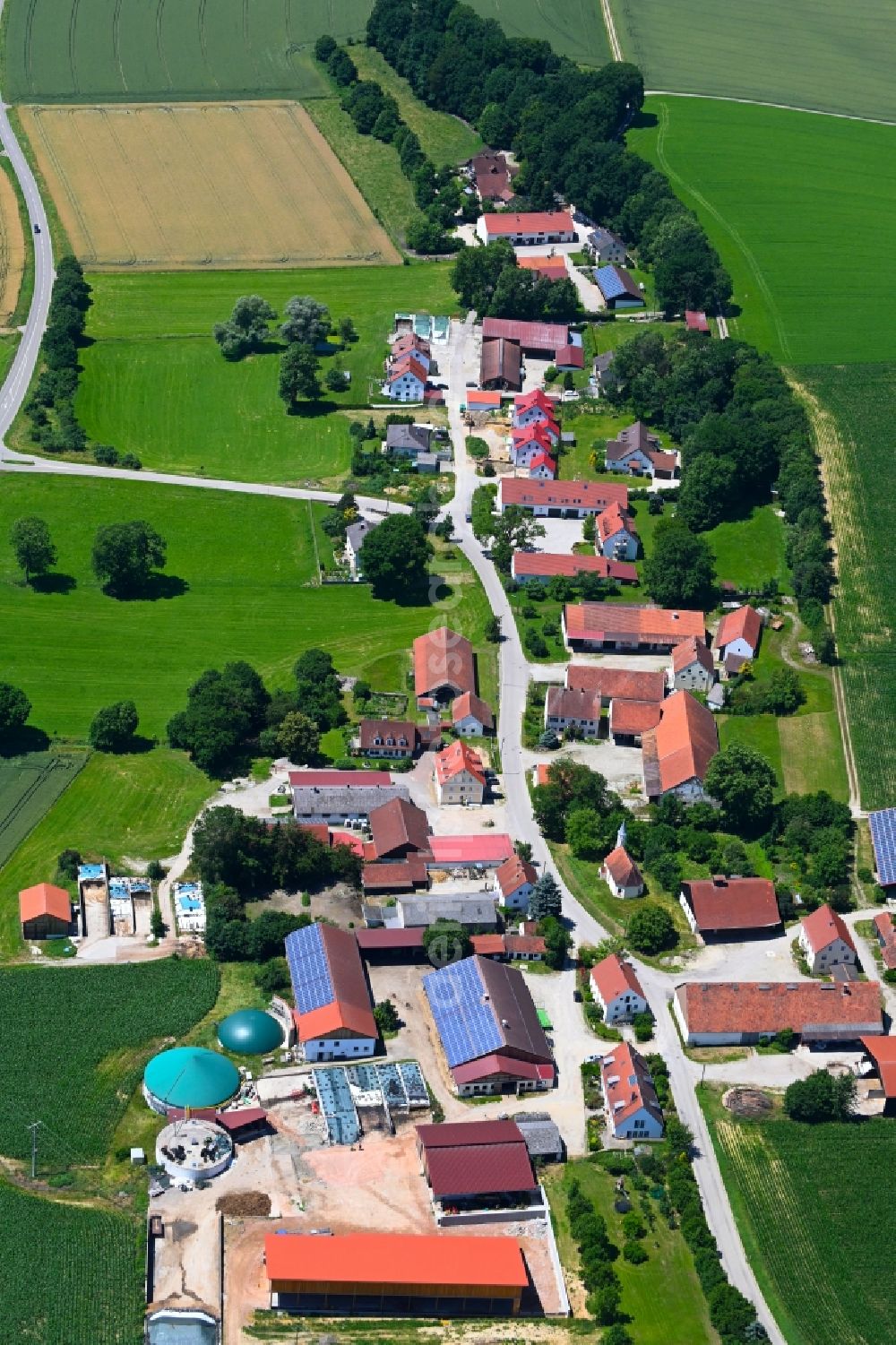 Sulzrain from above - Agricultural land and field boundaries surround the settlement area of the village in Sulzrain in the state Bavaria, Germany