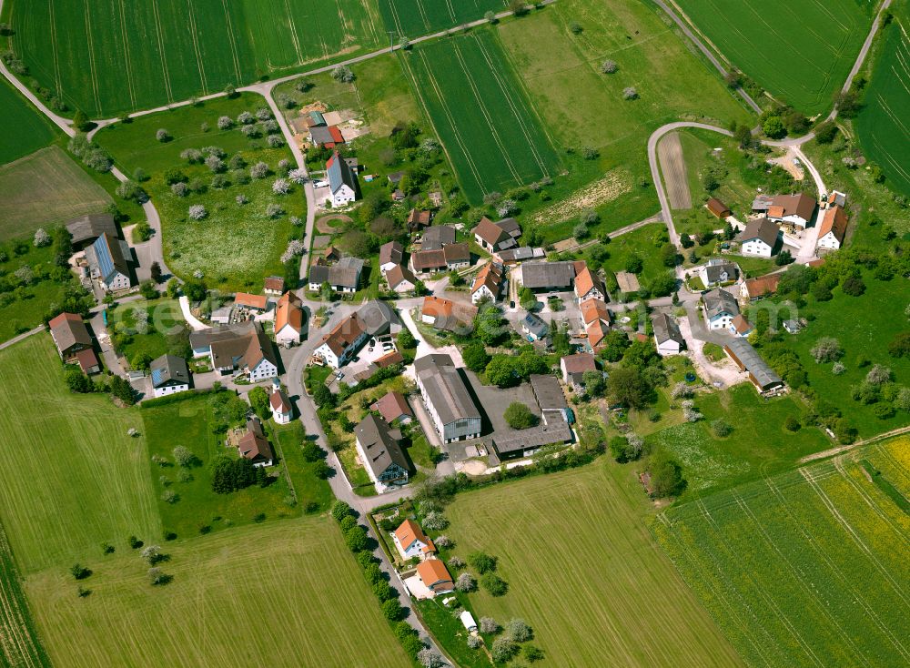 Talheim from above - Agricultural land and field boundaries surround the settlement area of the village in Talheim in the state Baden-Wuerttemberg, Germany