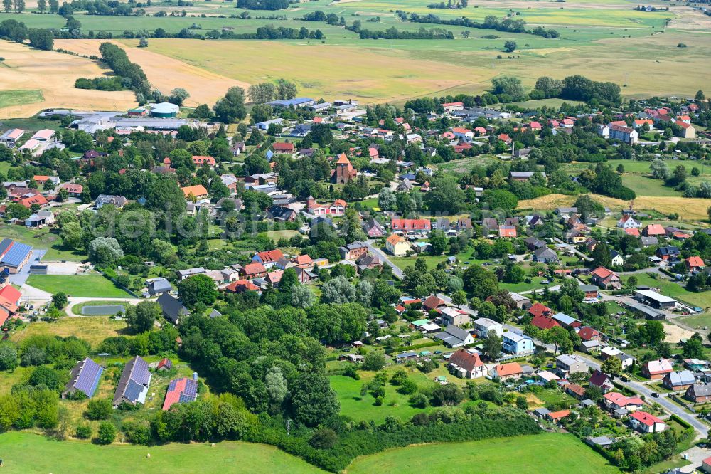 Aerial image Tarnow - Agricultural land and field boundaries surround the settlement area of the village in Tarnow in the state Mecklenburg - Western Pomerania, Germany