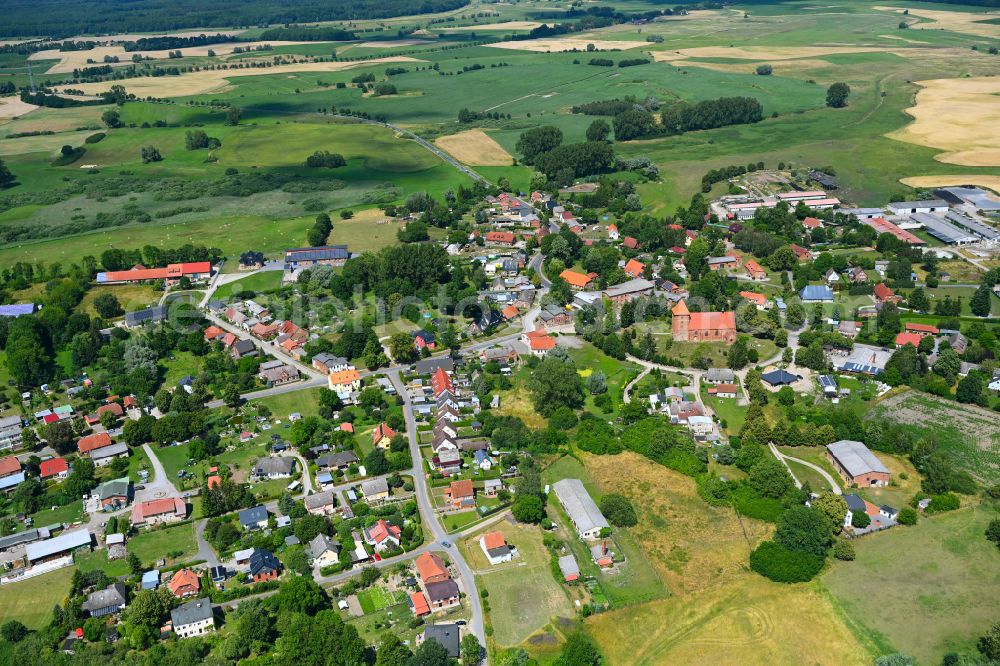 Aerial image Tarnow - Agricultural land and field boundaries surround the settlement area of the village in Tarnow in the state Mecklenburg - Western Pomerania, Germany