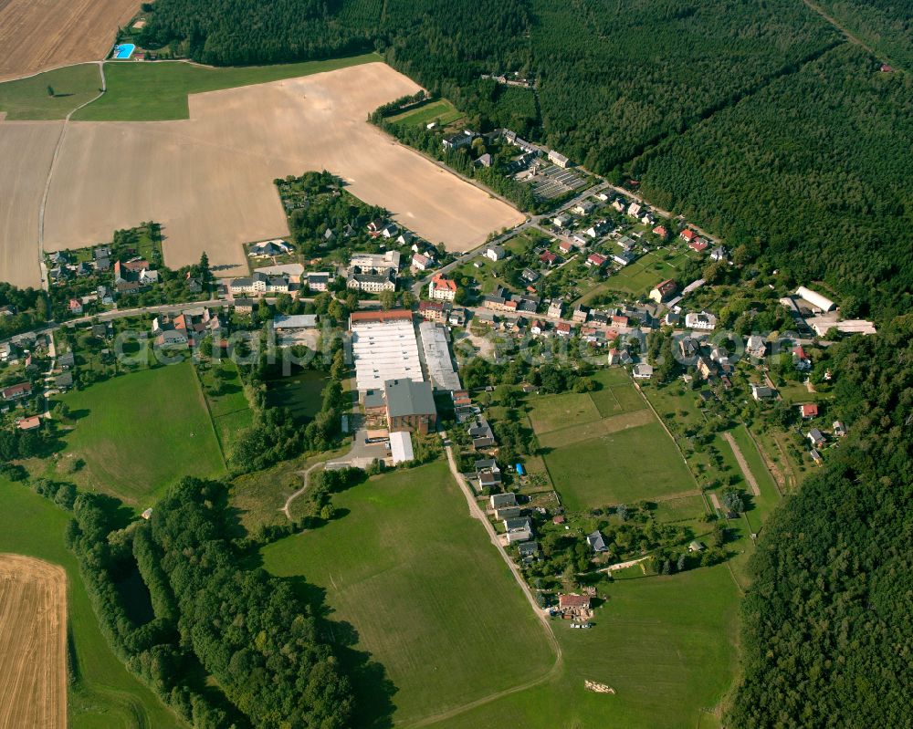 Teichwolframsdorf from above - Agricultural land and field boundaries surround the settlement area of the village in Teichwolframsdorf in the state Thuringia, Germany