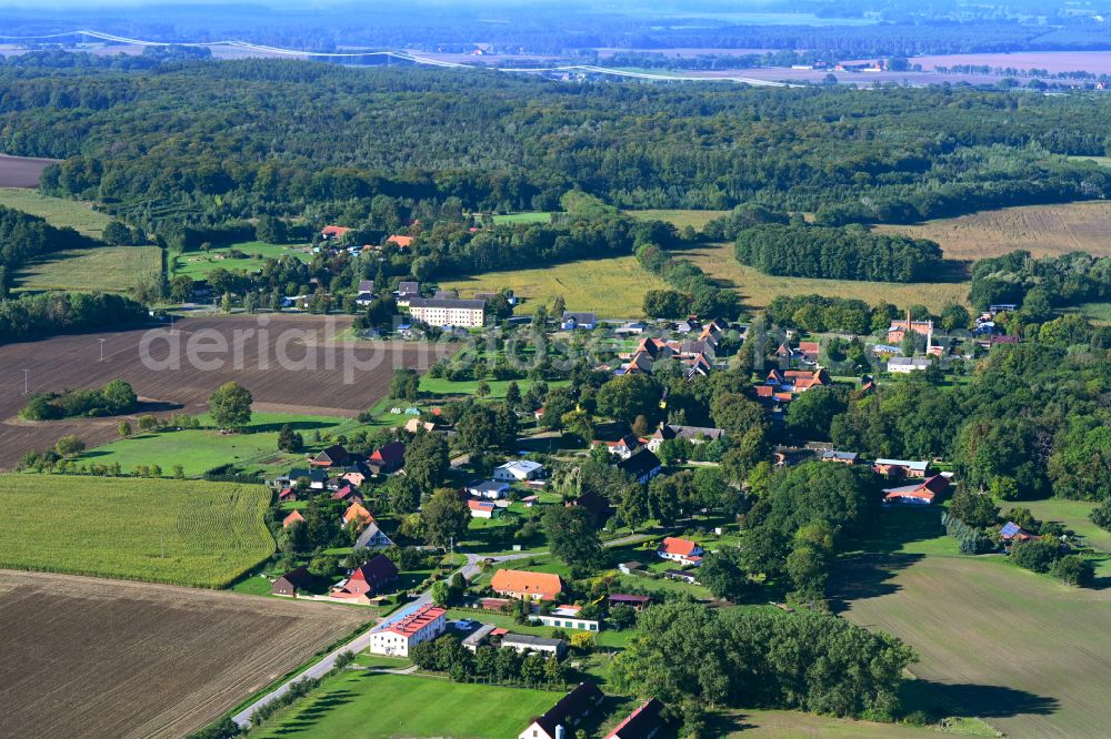 Aerial photograph Tessenow - Agricultural land and field boundaries surround the settlement area of the village in Tessenow in the state Mecklenburg - Western Pomerania, Germany