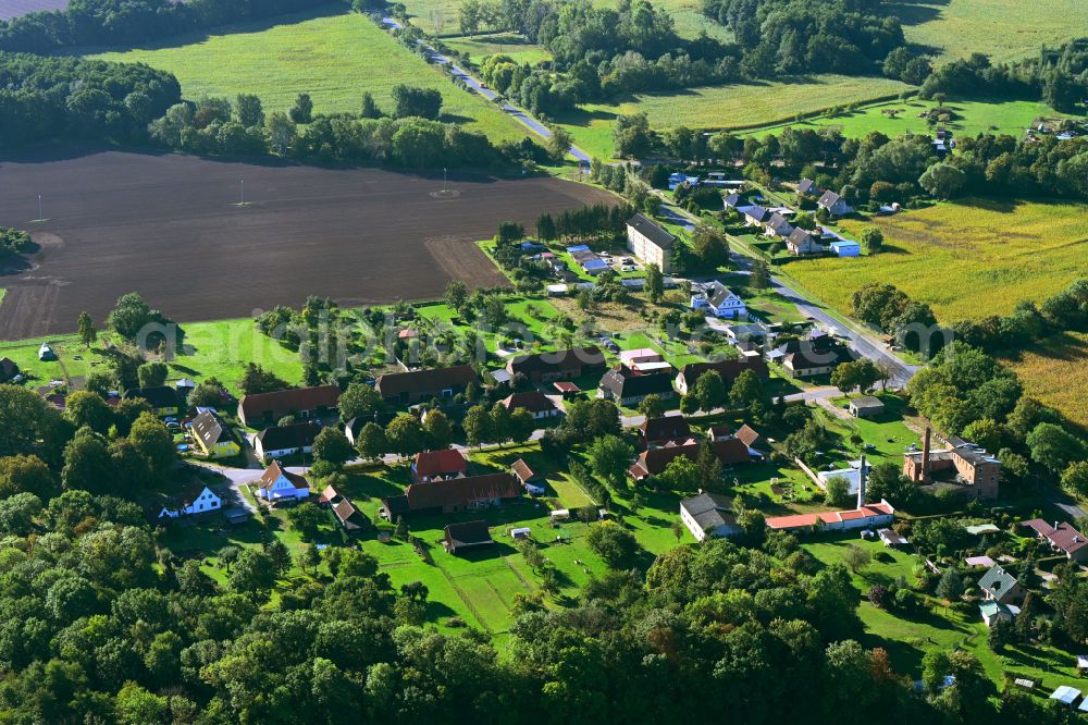 Aerial image Tessenow - Agricultural land and field boundaries surround the settlement area of the village in Tessenow in the state Mecklenburg - Western Pomerania, Germany