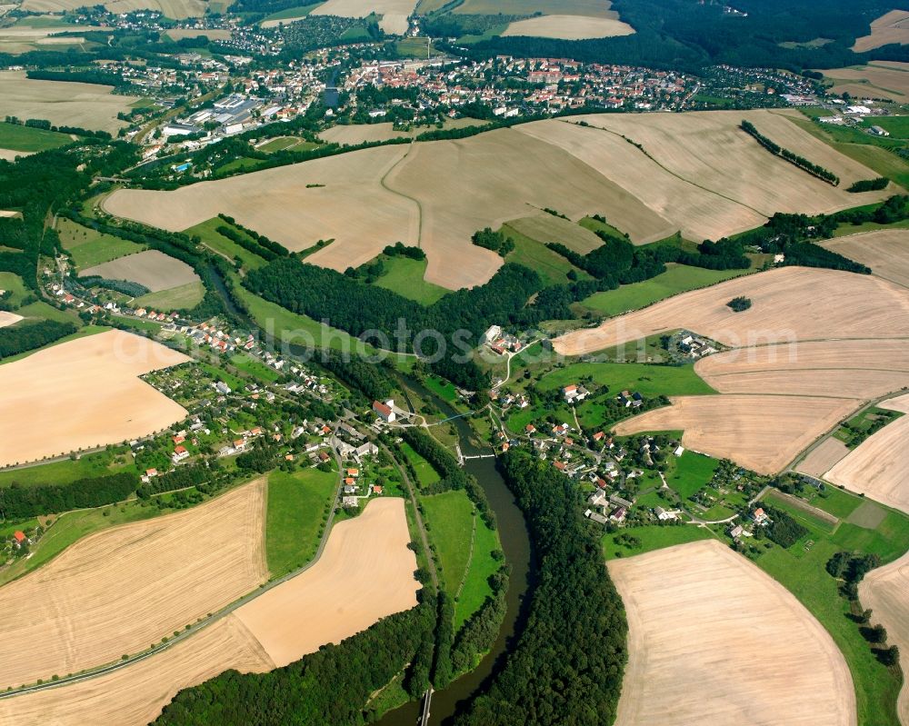 Aerial photograph Thierbach - Agricultural land and field boundaries surround the settlement area of the village in Thierbach in the state Saxony, Germany