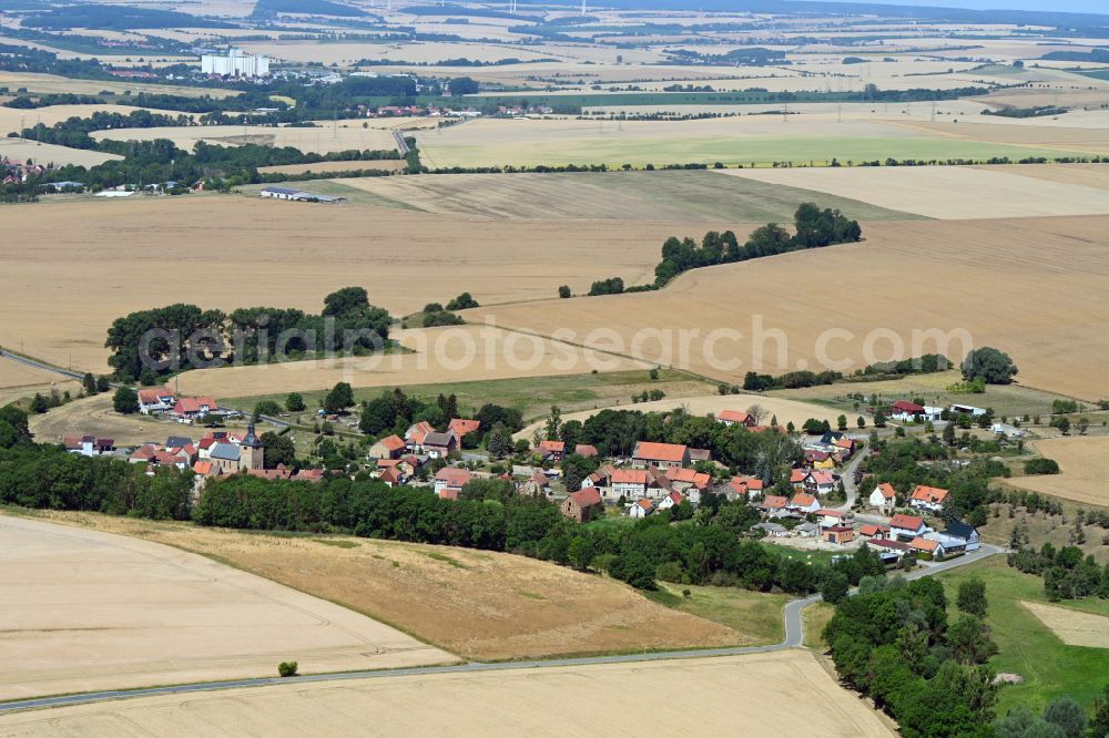 Aerial image Thüringenhausen - Agricultural land and field boundaries surround the settlement area of the village in Thueringenhausen in the state Thuringia, Germany