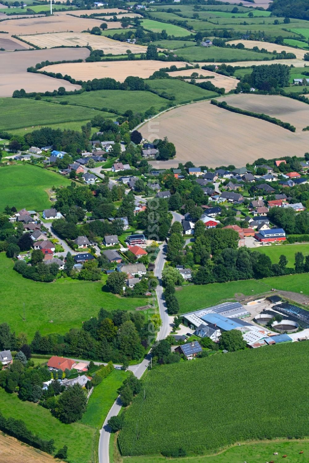 Aerial image Thumby - Agricultural land and field boundaries surround the settlement area of the village in Thumby in the state Schleswig-Holstein, Germany