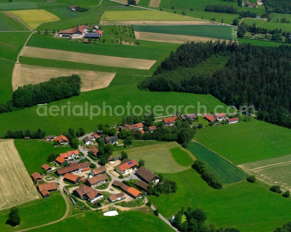 Thurasdorf from the bird's eye view: Agricultural land and field boundaries surround the settlement area of the village in Thurasdorf in the state Bavaria, Germany