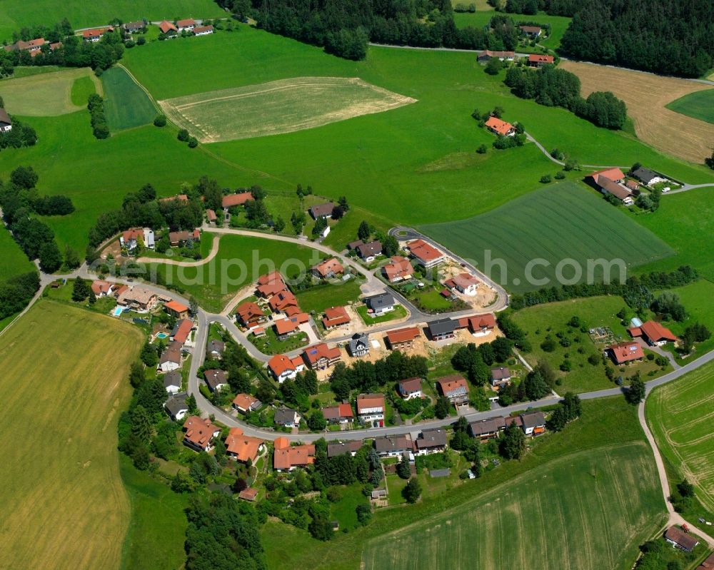 Thurasdorf from the bird's eye view: Agricultural land and field boundaries surround the settlement area of the village in Thurasdorf in the state Bavaria, Germany