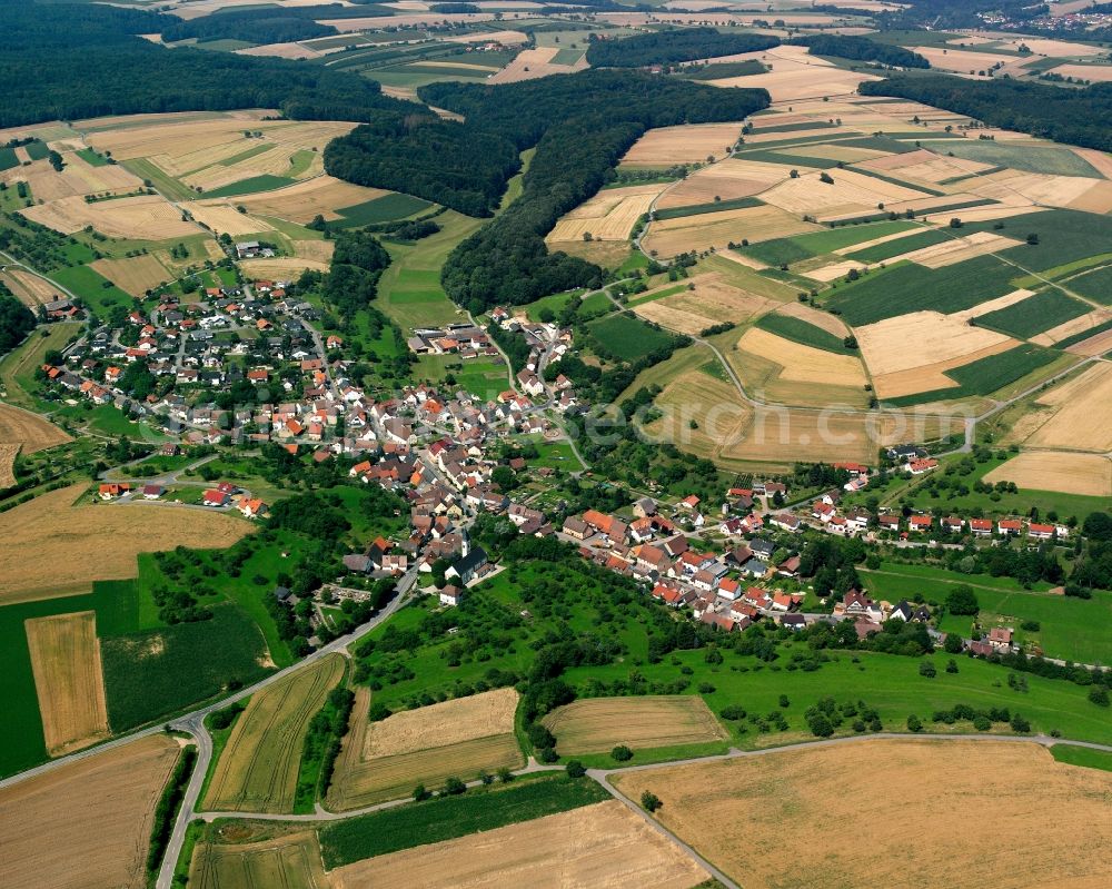 Tiefenbach from the bird's eye view: Agricultural land and field boundaries surround the settlement area of the village in Tiefenbach in the state Baden-Wuerttemberg, Germany