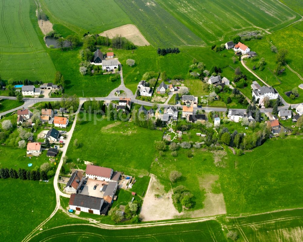 Topfseifersdorf from above - Agricultural land and field boundaries surround the settlement area of the village in Topfseifersdorf in the state Saxony, Germany