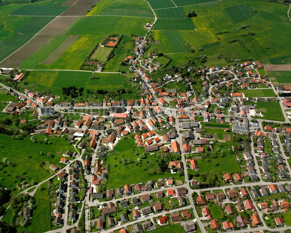 Treffelhausen from above - Agricultural land and field boundaries surround the settlement area of the village in Treffelhausen in the state Baden-Wuerttemberg, Germany