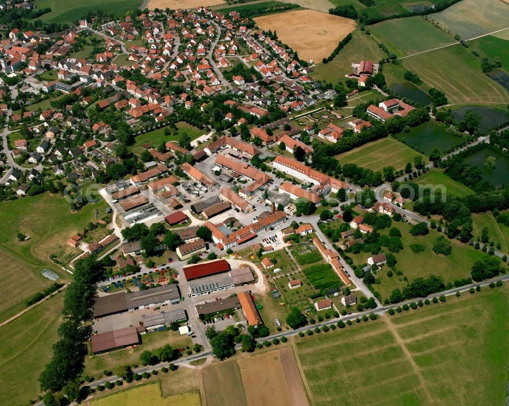 Aerial photograph Triesdorf - Agricultural land and field boundaries surround the settlement area of the village in Triesdorf in the state Bavaria, Germany