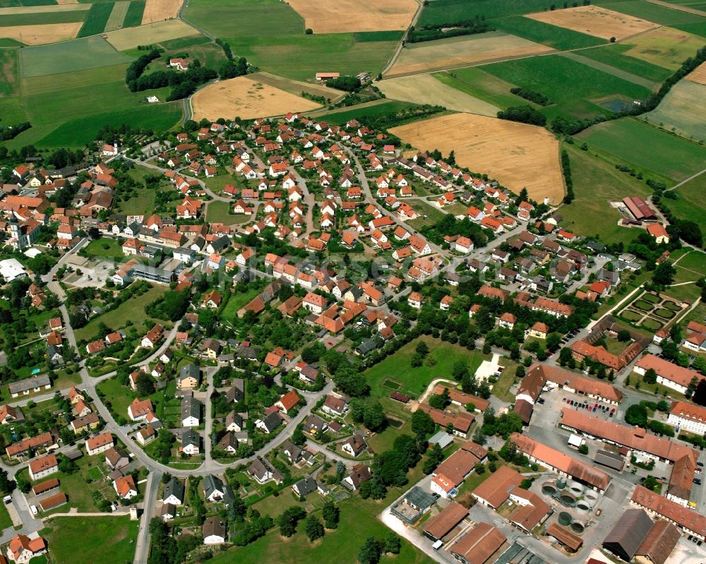 Aerial image Triesdorf - Agricultural land and field boundaries surround the settlement area of the village in Triesdorf in the state Bavaria, Germany