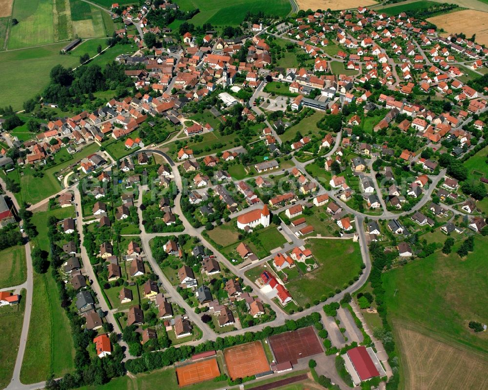 Aerial photograph Triesdorf - Agricultural land and field boundaries surround the settlement area of the village in Triesdorf in the state Bavaria, Germany