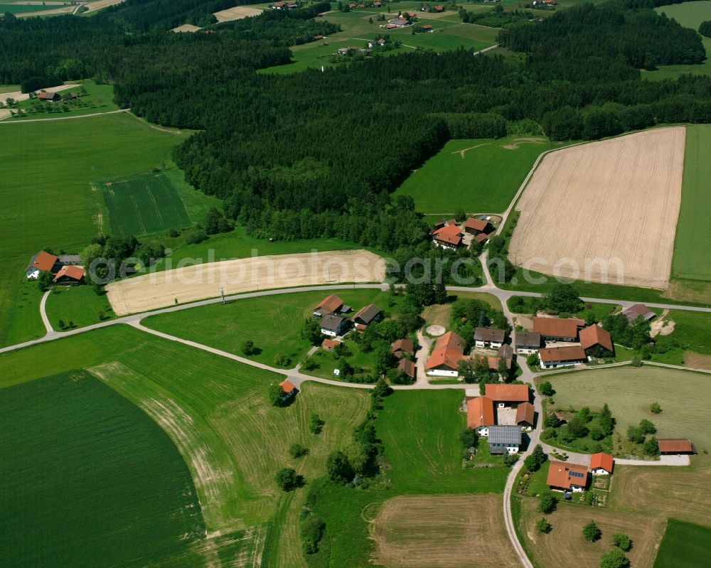 Triftern from the bird's eye view: Agricultural land and field boundaries surround the settlement area of the village in Triftern in the state Bavaria, Germany