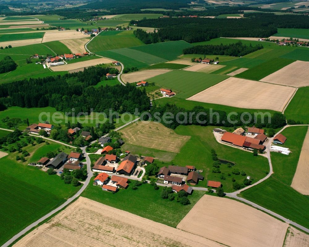 Aerial image Triftern - Agricultural land and field boundaries surround the settlement area of the village in Triftern in the state Bavaria, Germany